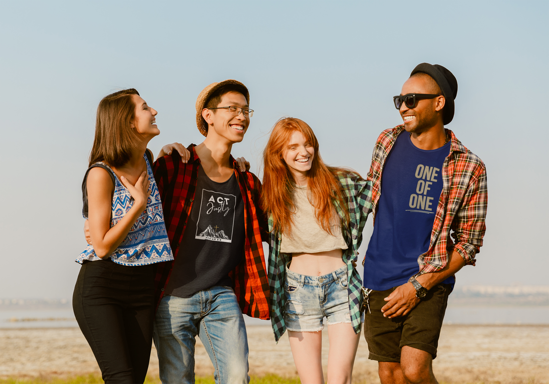 Group of friends wearing meaningful Christian graphic tees.