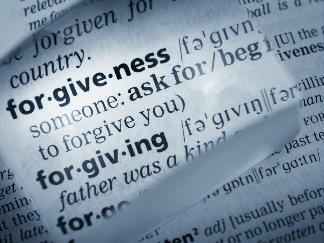 Close up image of the definition for forgiveness