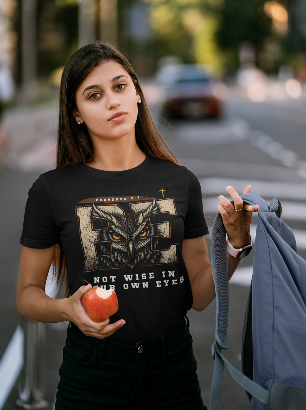 Youth female wearing a Christian graphic tee with an owl as the center and Proverbs 3:7 as the scripture.