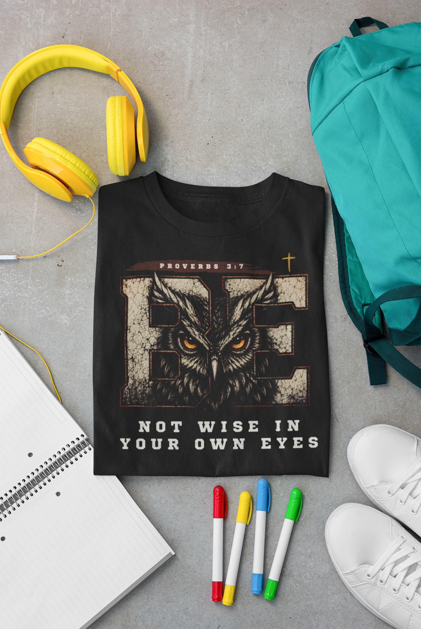 folded black bible verse tee featuring proverbs 3:7 