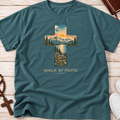 blue spruce comfort colors shirt with a cross and landscape sunset with the words 'walk by faith' underneath and '2 corinthians 5:7'
